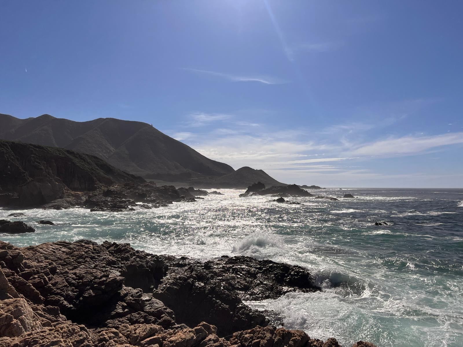 Eliot Fisher’s photograph of sunlight sparkling on coastal water